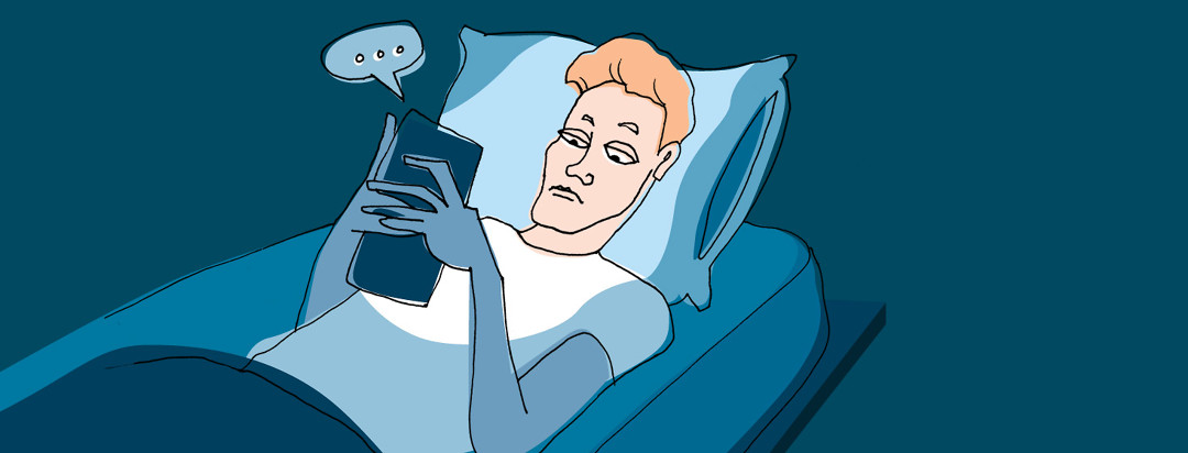person texting in bed