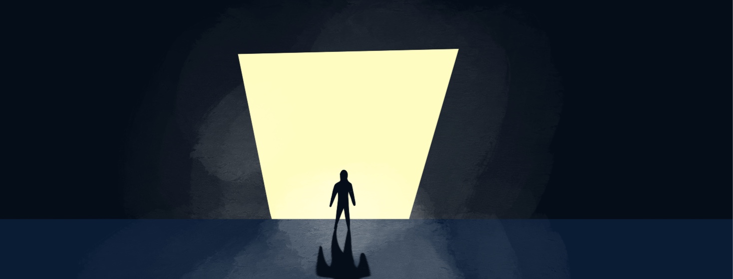 person standing in front of a daunting doorway