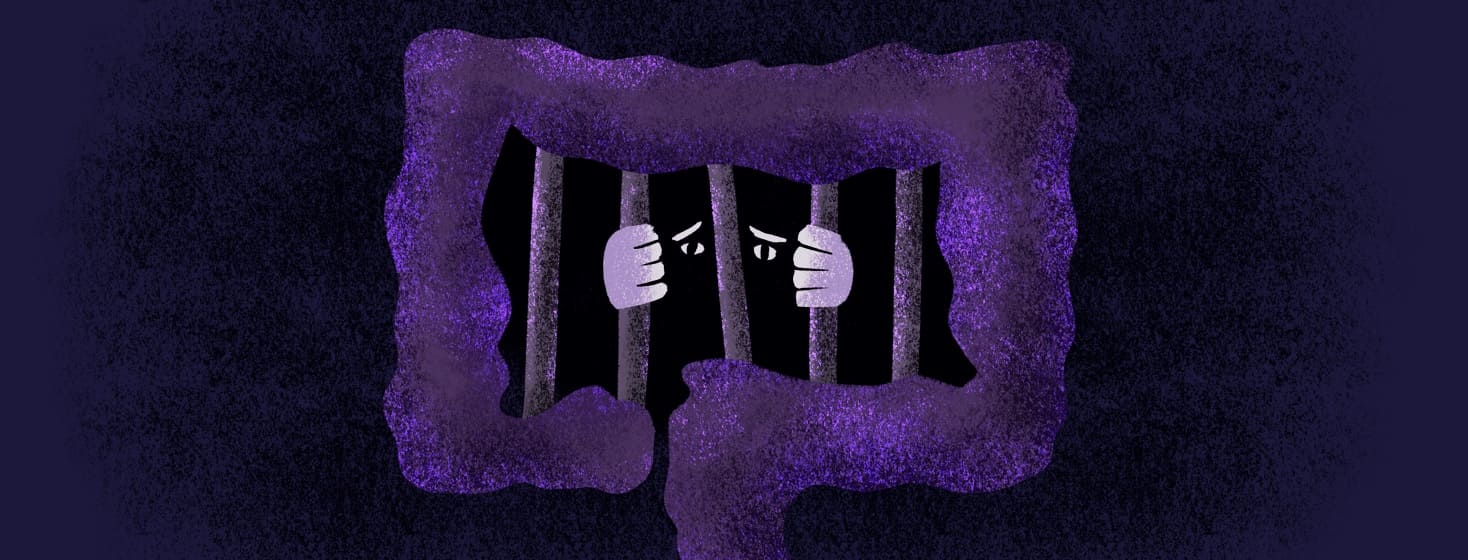 person trapped in a colon with prison bars