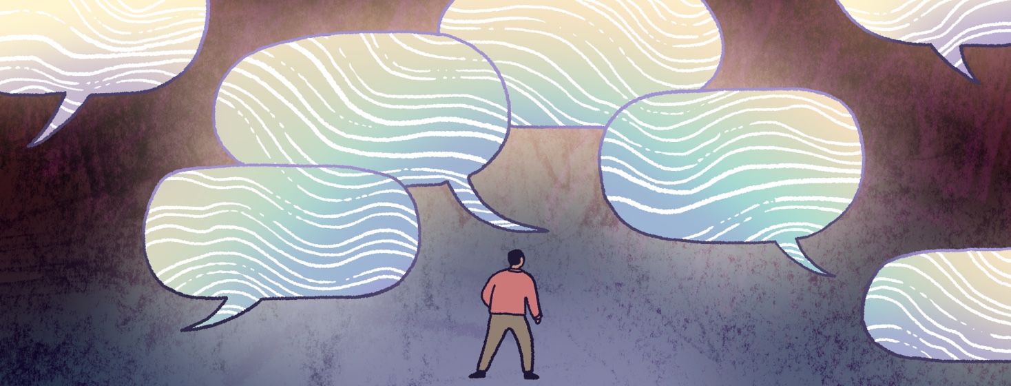 A man stands in the center of many glowing speech bubbles that light up the darkness around him