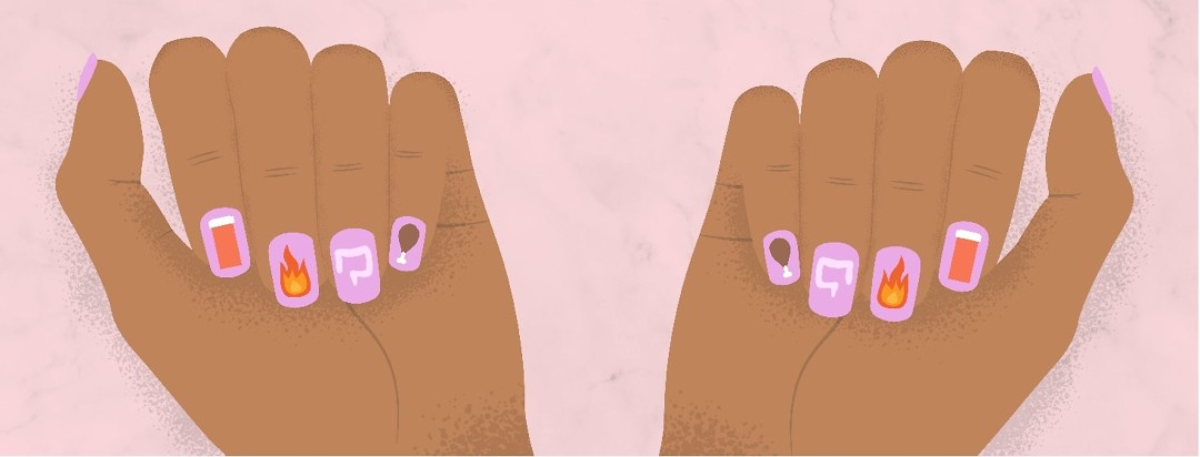 Hands with a manicure that has icons of different ibd related things like food, flares, pills, medication, and a colon.