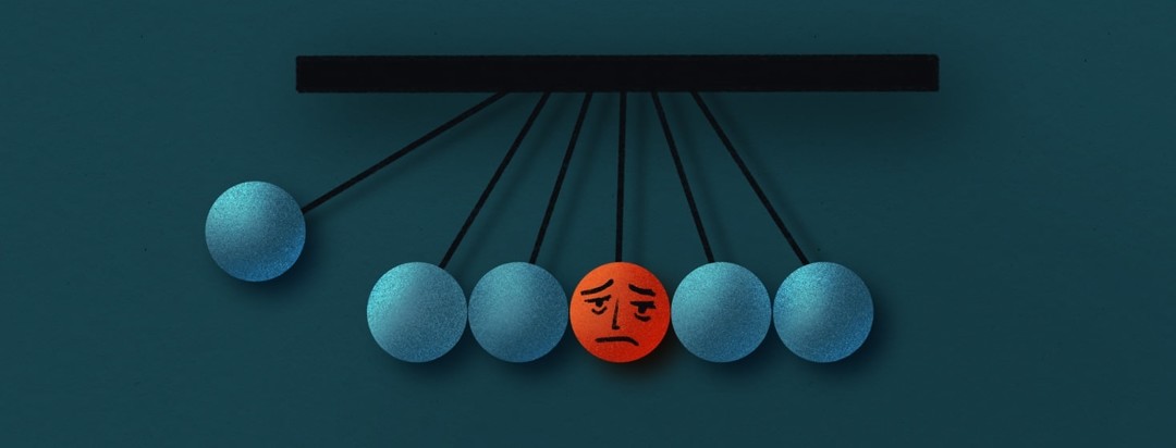 a newton's cradle with a sad, tired face in the middle ball