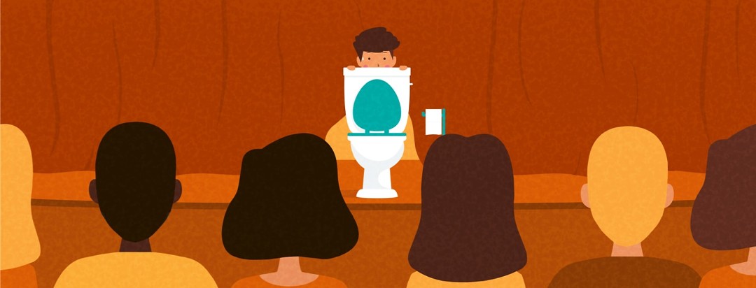 a person embarrassed hiding behind a toilet on a stage