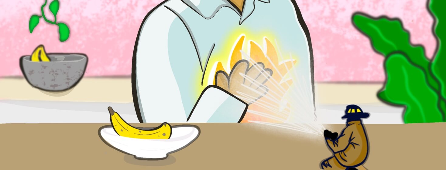 A man in a kitchen next to a banana holds a hand to his stomach as it is on fire and a little firefighter sprays water at the flames.