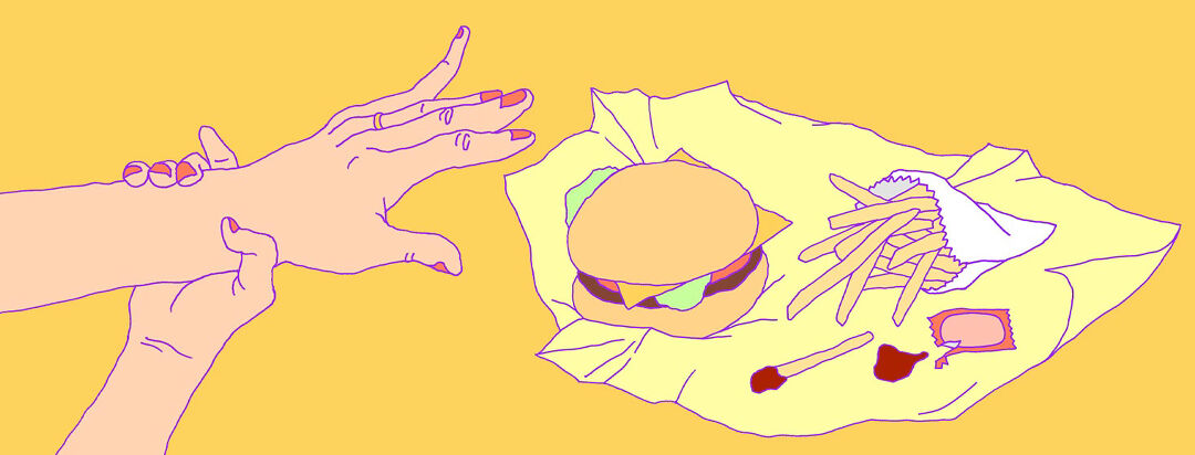 a person pulls their hand away from tempting fast food burger fries