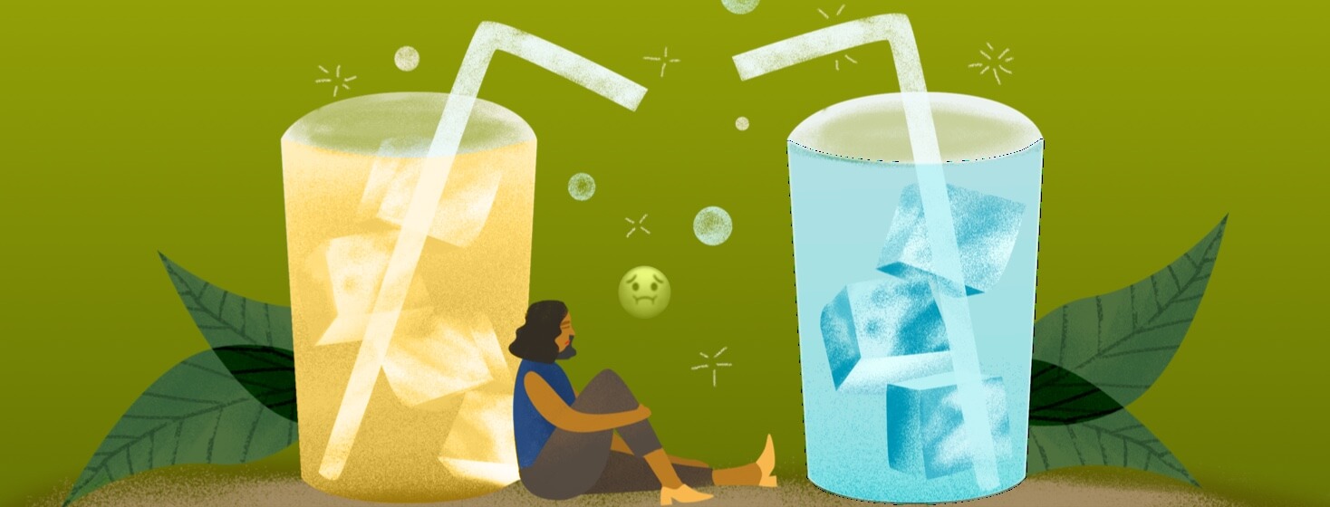 A nauseous woman sits between a glass of ginger-ale and a glass of water.