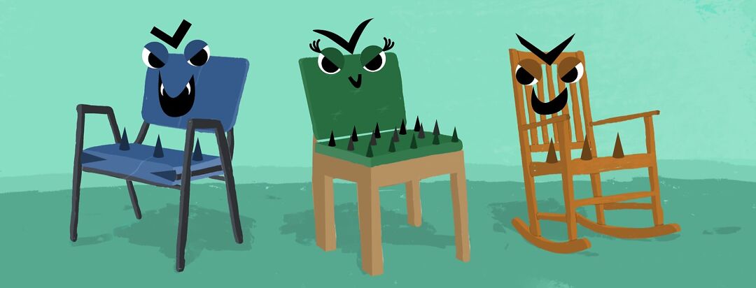 Three different uncomfortable looking chairs are lined up in a row. They have evil eyes, smirks, and sharp spikes.